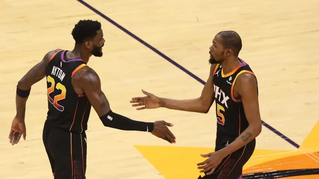 Getty Suns stars Deandre Ayton and Kevin Durant